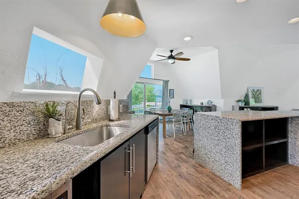 a kitchen with counter space cabinets and appliances