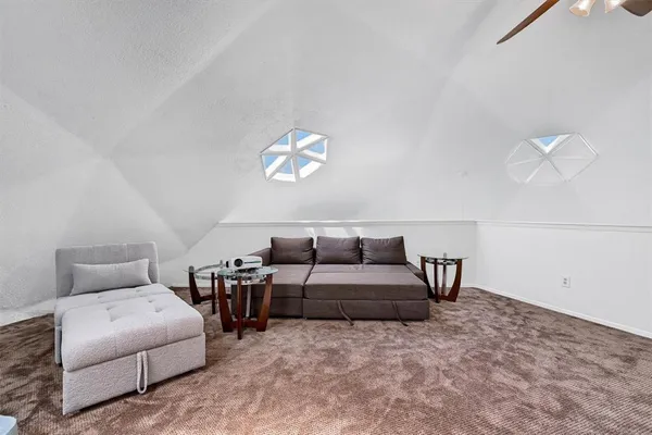 a bedroom with furniture and a couch