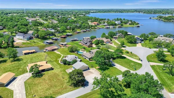 an aerial view of lake residential house with outdoor space