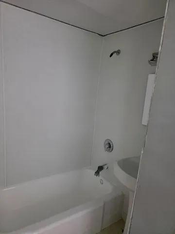 a bathroom with a bathtub