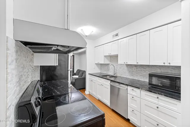 a view of a houses with a balcony