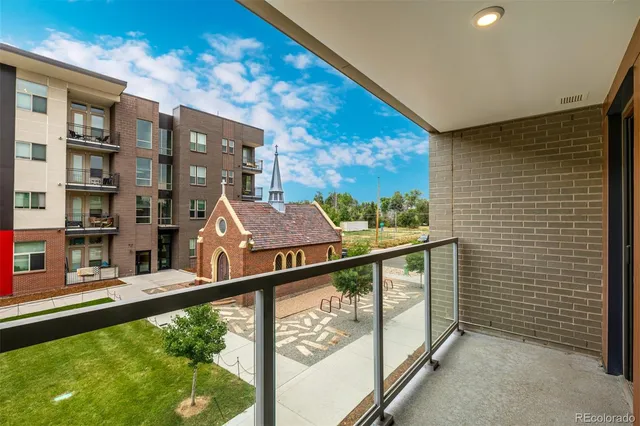 a view of balcony with two flat screen tv