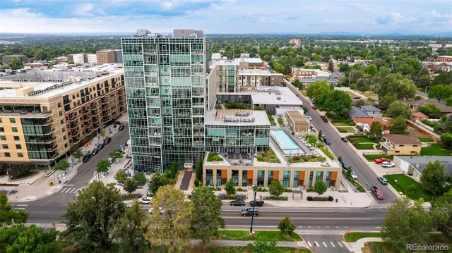 a view of large building with a city street