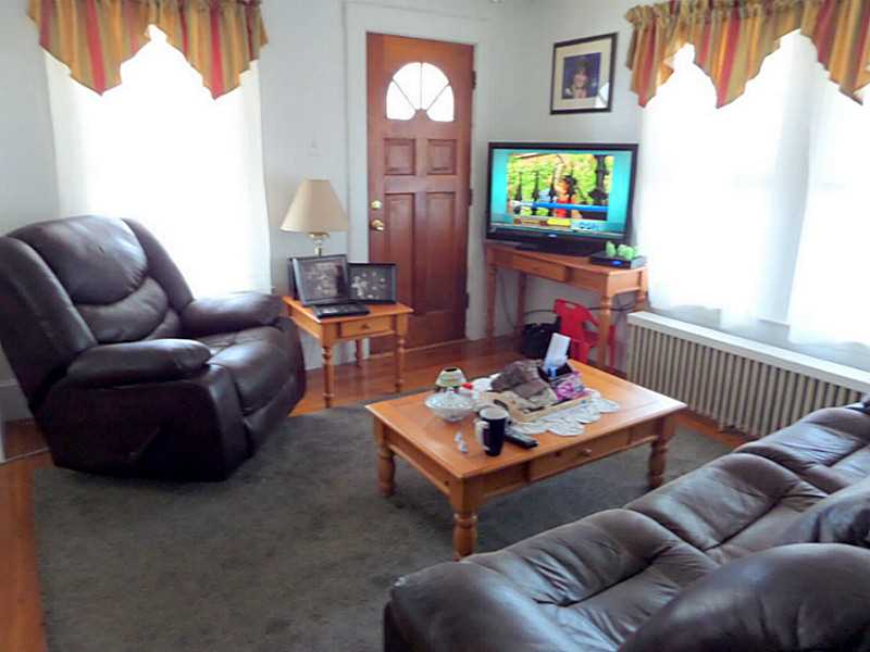 106 Hebert Avenue Woonsocket, RI 02895 - Photo 2 of 12 Living Room.