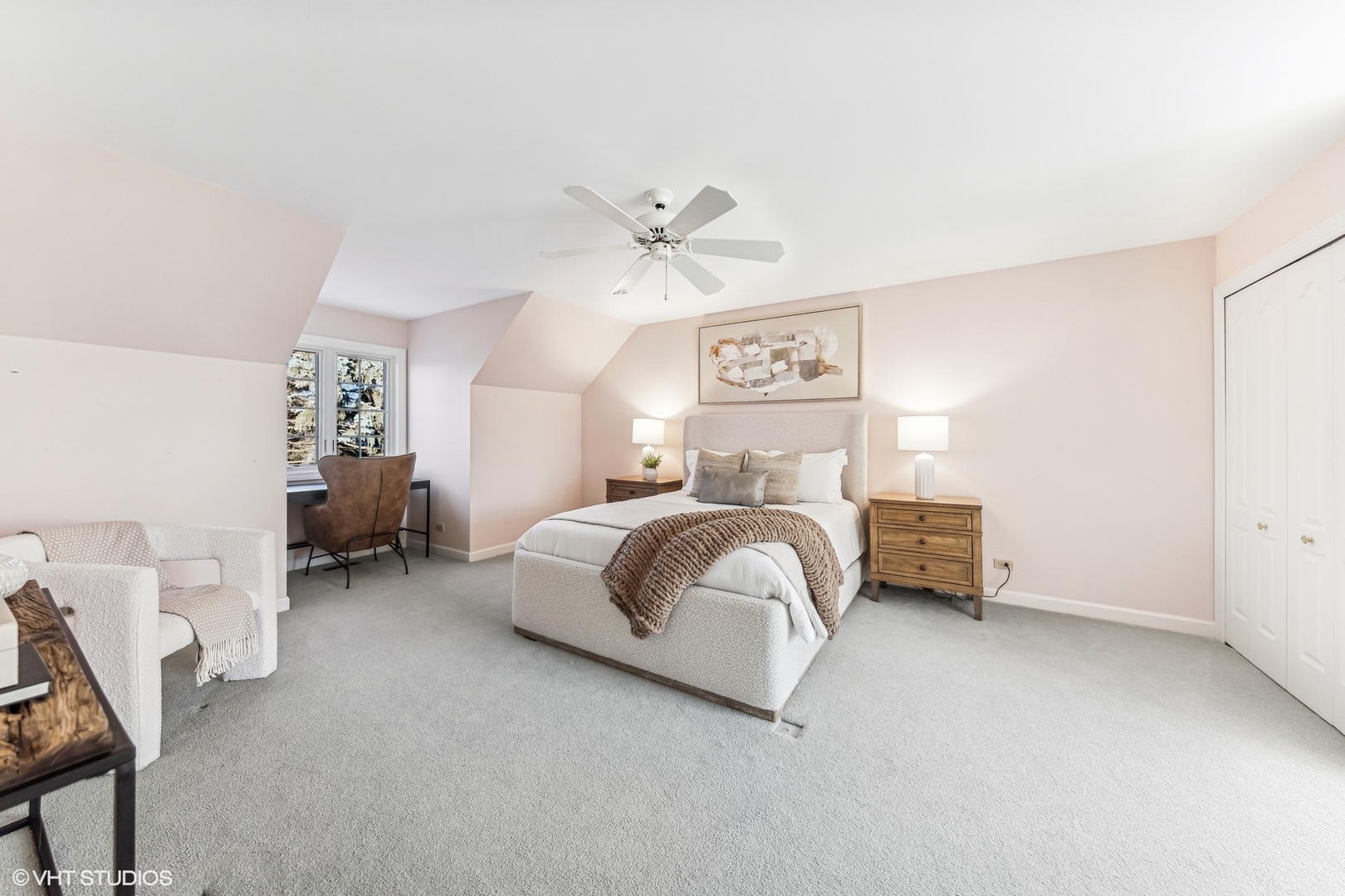 16 Lake Ridge Club Court Burr Ridge, IL 60527 - Photo 16 of 26 a bedroom with a bed and a chandelier