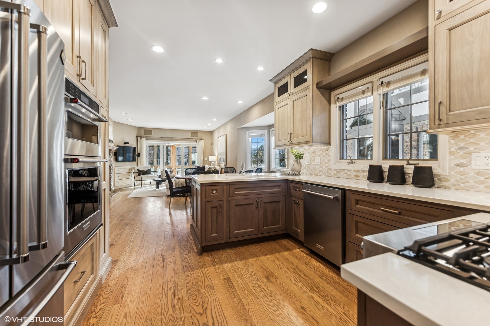 16 Lake Ridge Club Court Burr Ridge, IL 60527 - Photo 5 of 26 a kitchen with stainless steel appliances granite countertop a stove and a sink