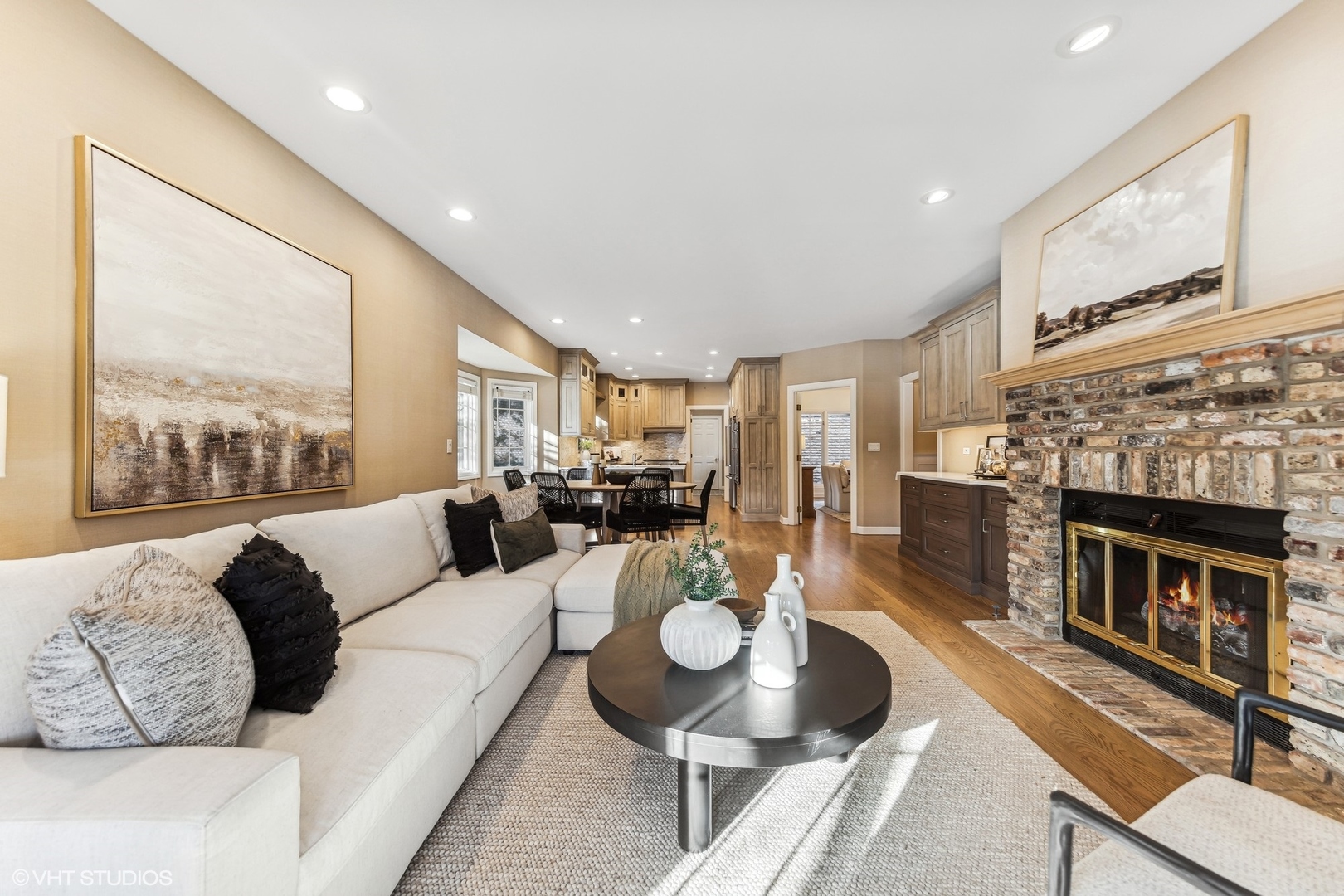 16 Lake Ridge Club Court Burr Ridge, IL 60527 - Photo 8 of 26 a living room with furniture and a fireplace