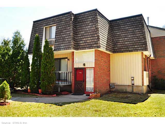 146 High Path Road, Unit 146 Windsor, CT 06095 - Photo 1 of 1 a front view of a house