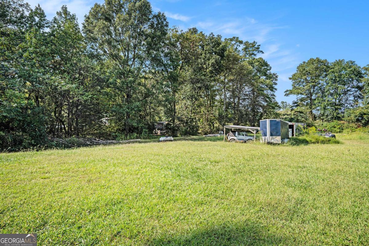 359 Norton Bridge Road Chatsworth, GA 30705 - Photo 26 of 28 a house view with a outdoor space