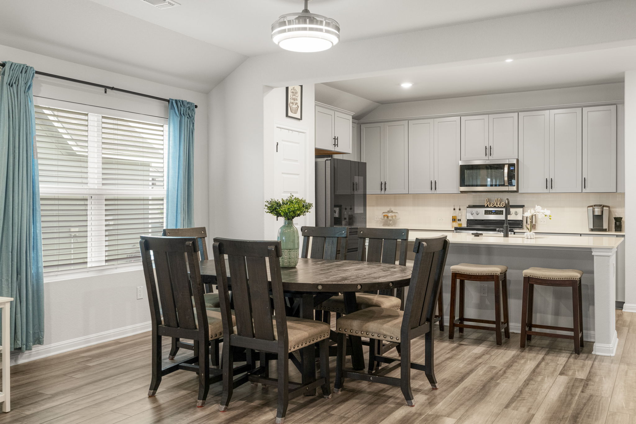 19412 Forman Drive Pflugerville, TX 78660 - Photo 13 of 34 This spacious dining area comfortably accommodates a full dining table for family dinners and entertaining guests.