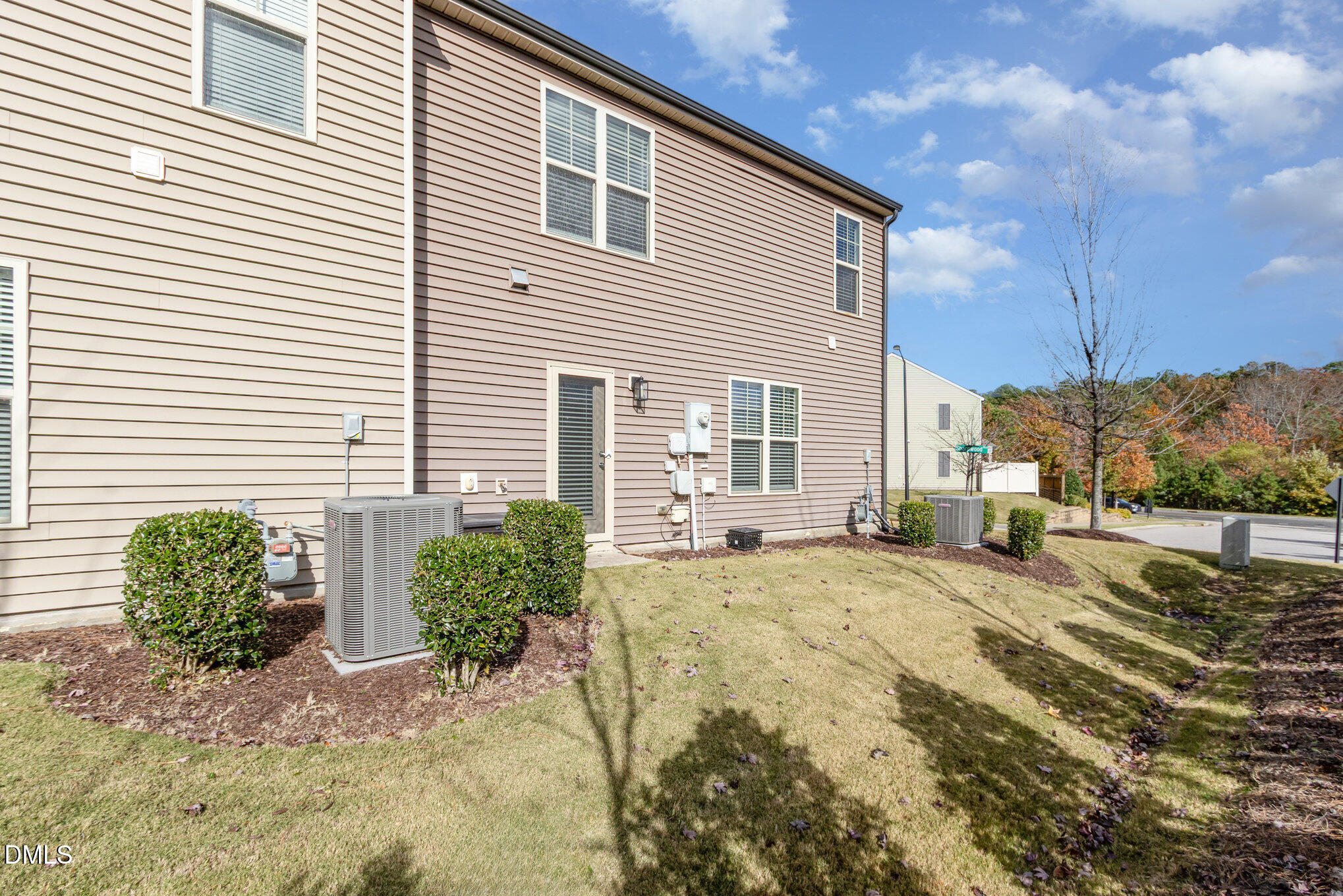 501 Brier Crossings Loop Durham, NC 27703 - Photo 26 of 31 a view of a house with backyard and windows