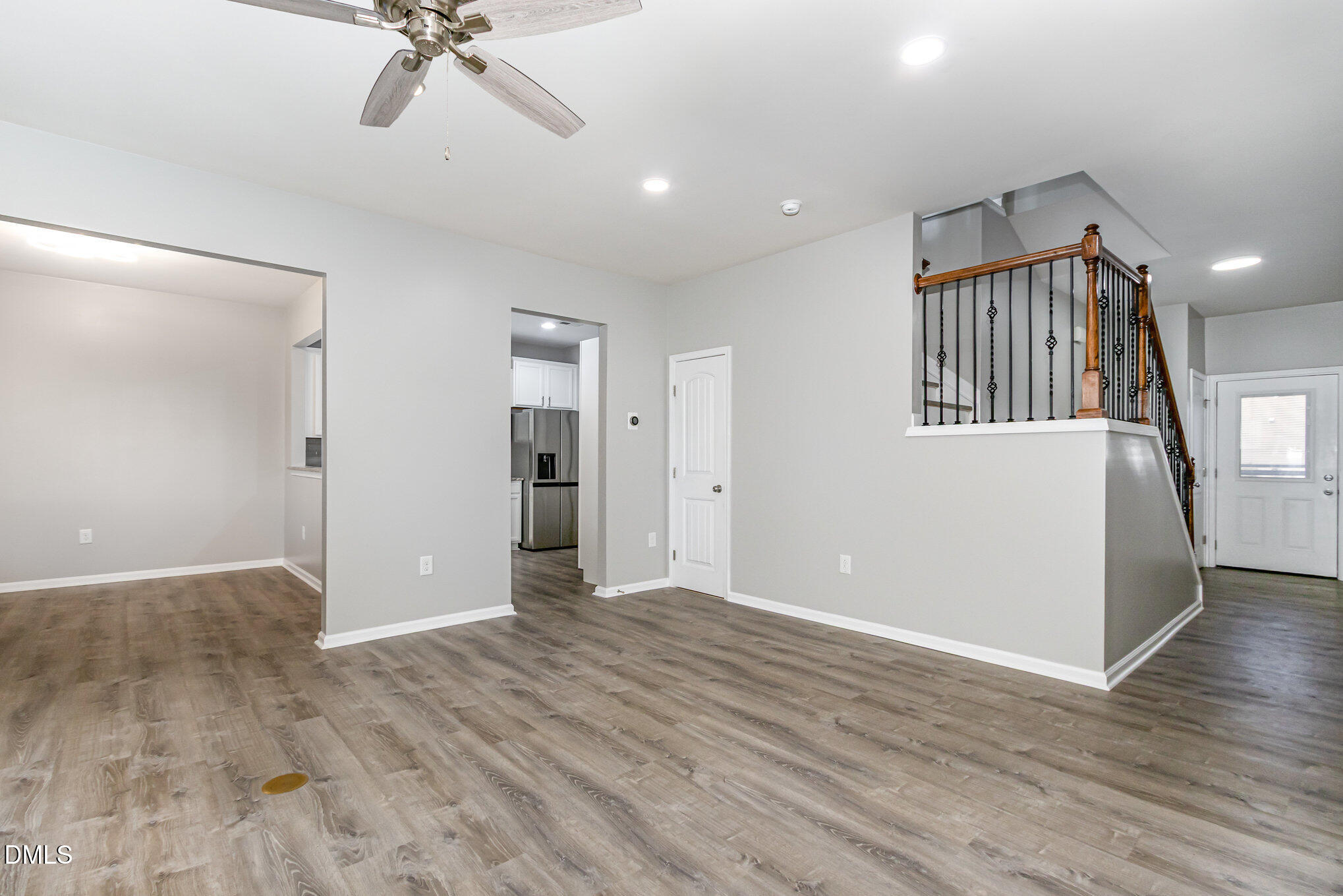 501 Brier Crossings Loop Durham, NC 27703 - Photo 7 of 31 wooden floor in an empty room with a window