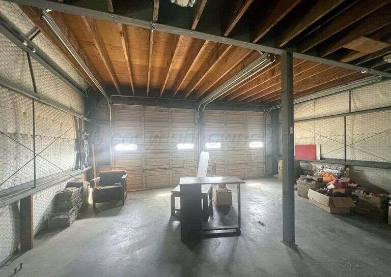 1401 Maple Avenue Panhandle, TX 79068 - Photo 39 of 42 a view of a garage with cars