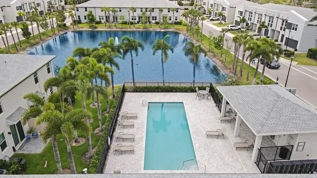 a view of a swimming pool with a patio