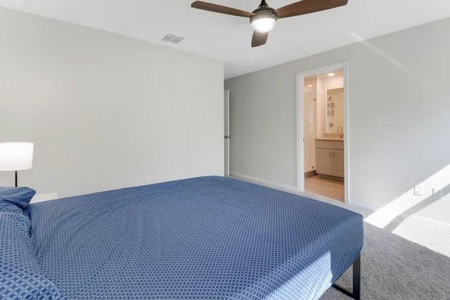 a view of a livingroom with a staircase