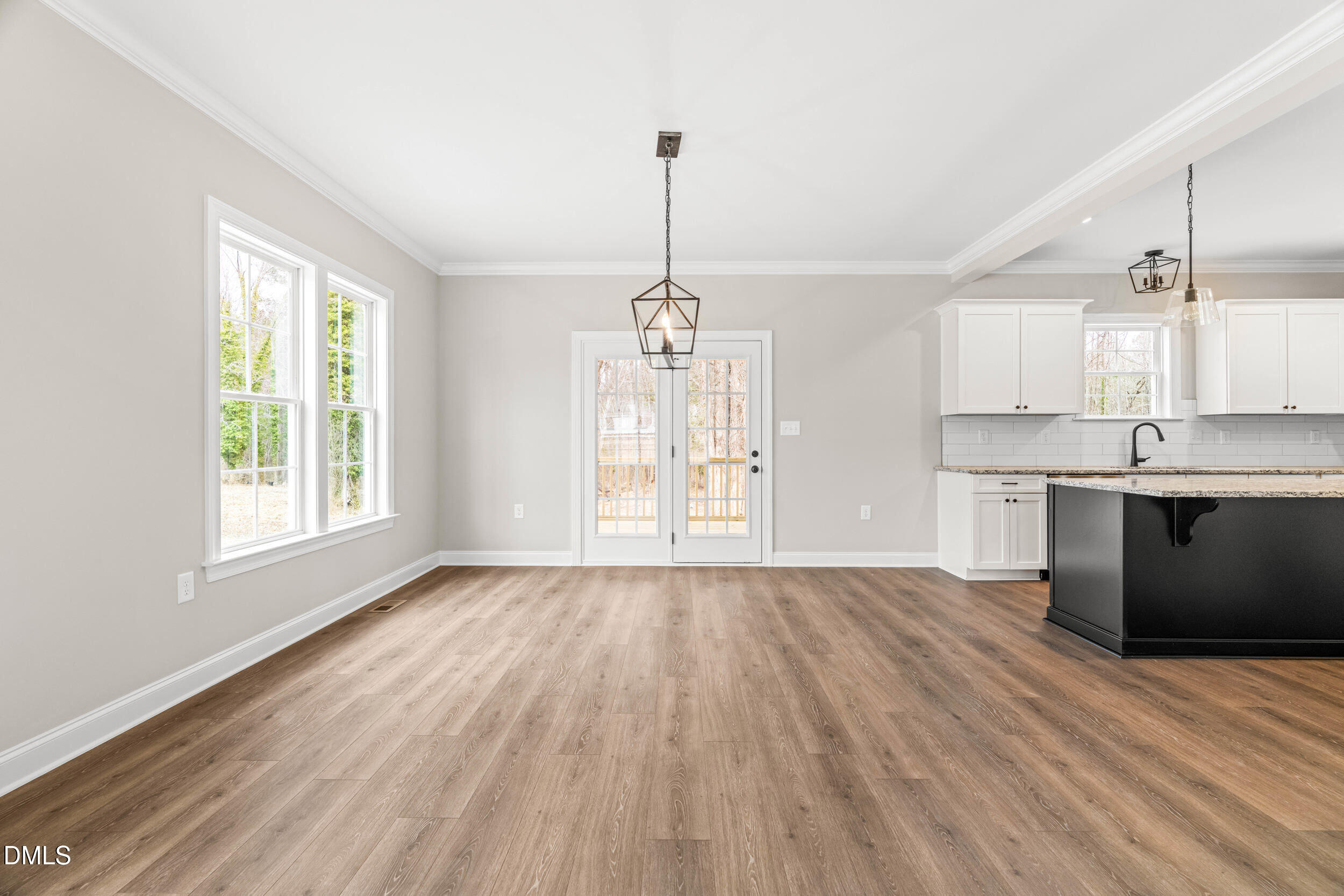 4029 Lake Wendell Road Wendell, NC 27591 - Photo 13 of 44 a view of a kitchen with granite countertop stainless steel appliances sink and cabinets
