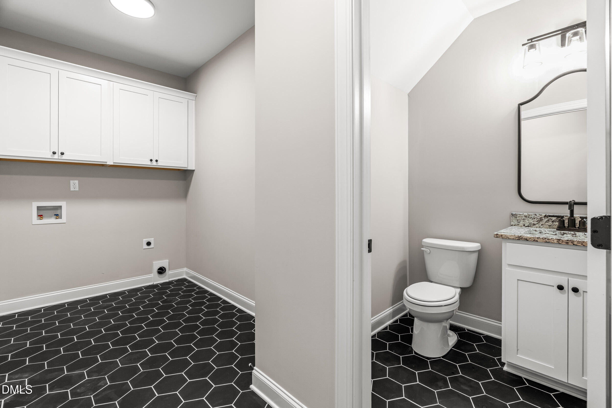 4029 Lake Wendell Road Wendell, NC 27591 - Photo 20 of 44 a bathroom with a sink and a toilet