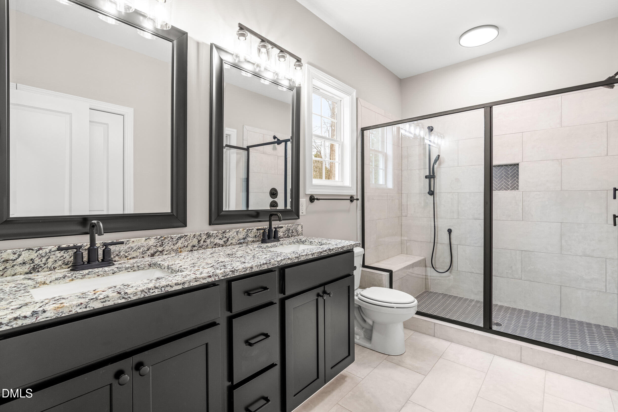 4029 Lake Wendell Road Wendell, NC 27591 - Photo 24 of 44 a bathroom with a granite countertop sink toilet and shower