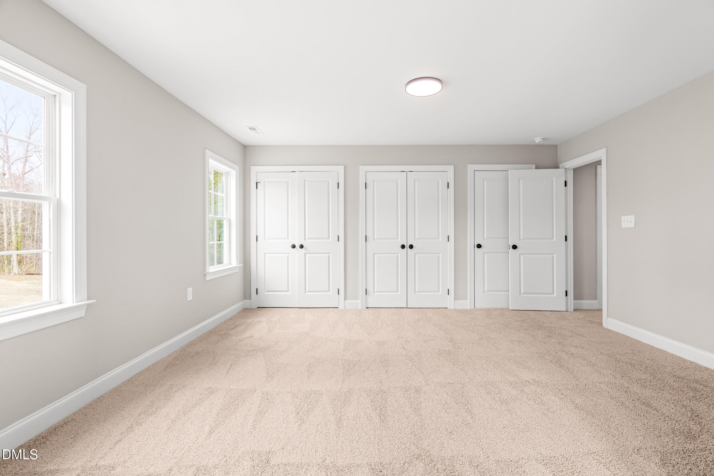 4029 Lake Wendell Road Wendell, NC 27591 - Photo 27 of 44 a view of an empty room with a window