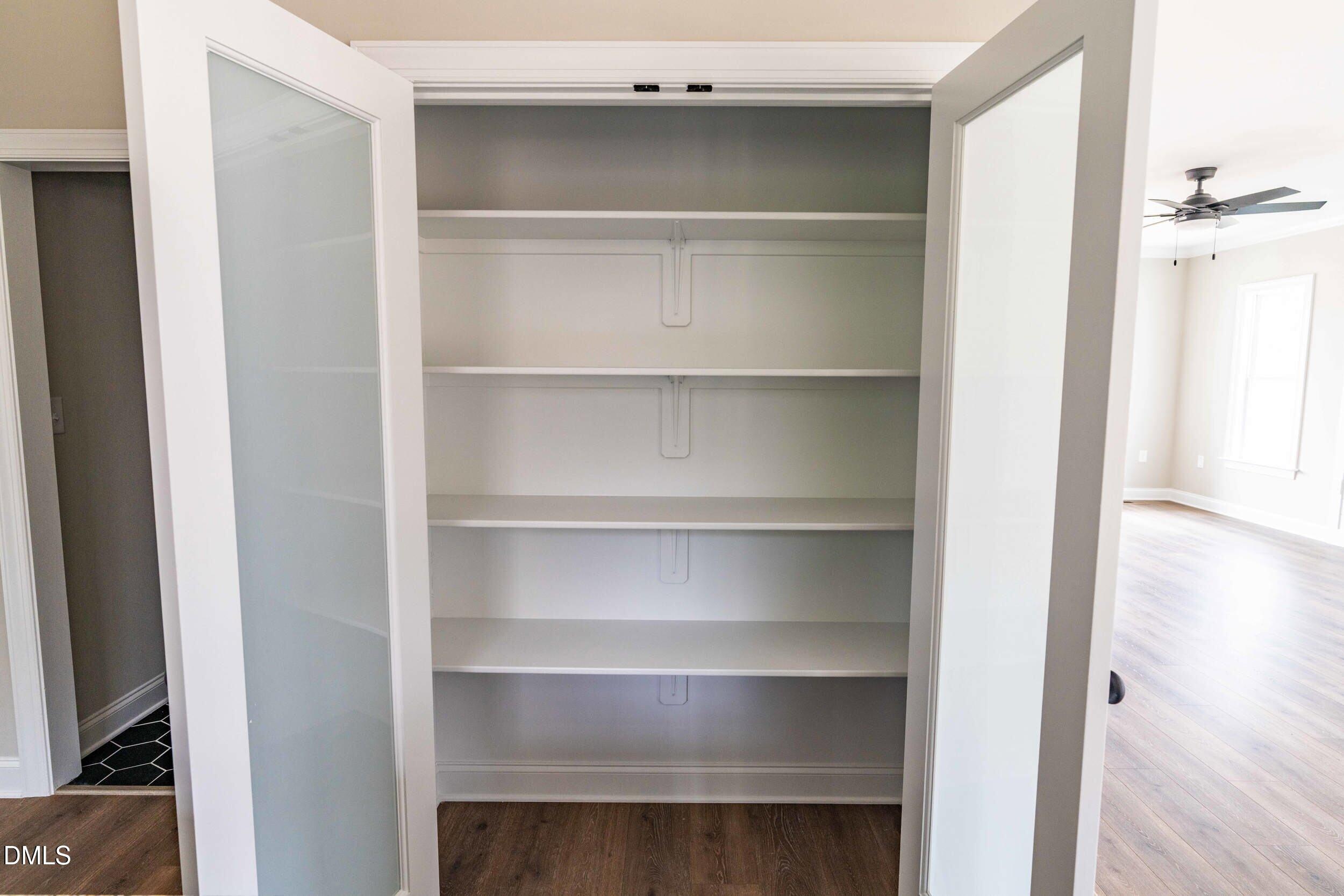 4029 Lake Wendell Road Wendell, NC 27591 - Photo 39 of 44 a view of walk in closet with empty racks