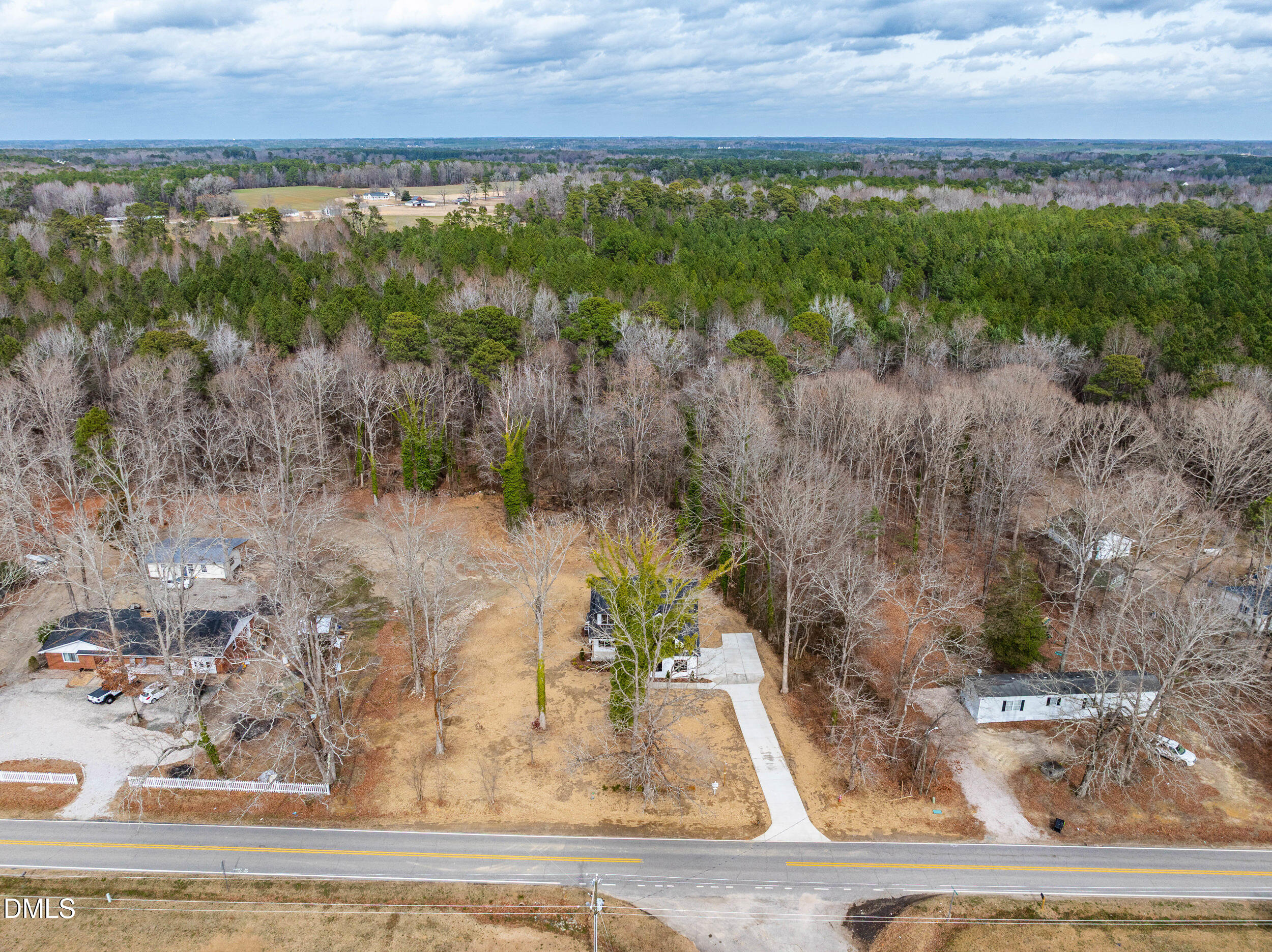 4029 Lake Wendell Road Wendell, NC 27591 - Photo 42 of 44 a view of a yard with an outdoor space