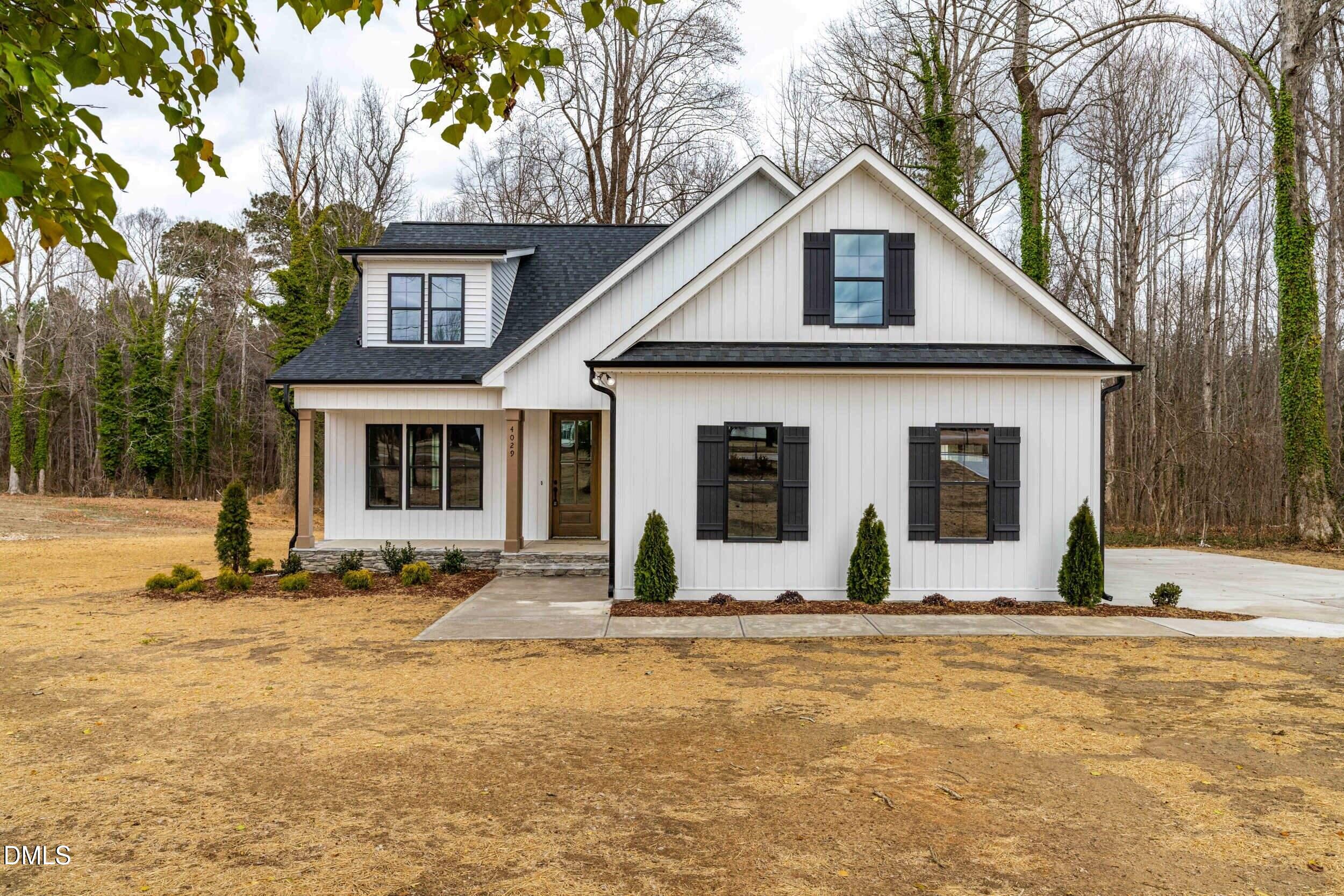 4029 Lake Wendell Road Wendell, NC 27591 - Photo 5 of 44 a view of a yard with a house
