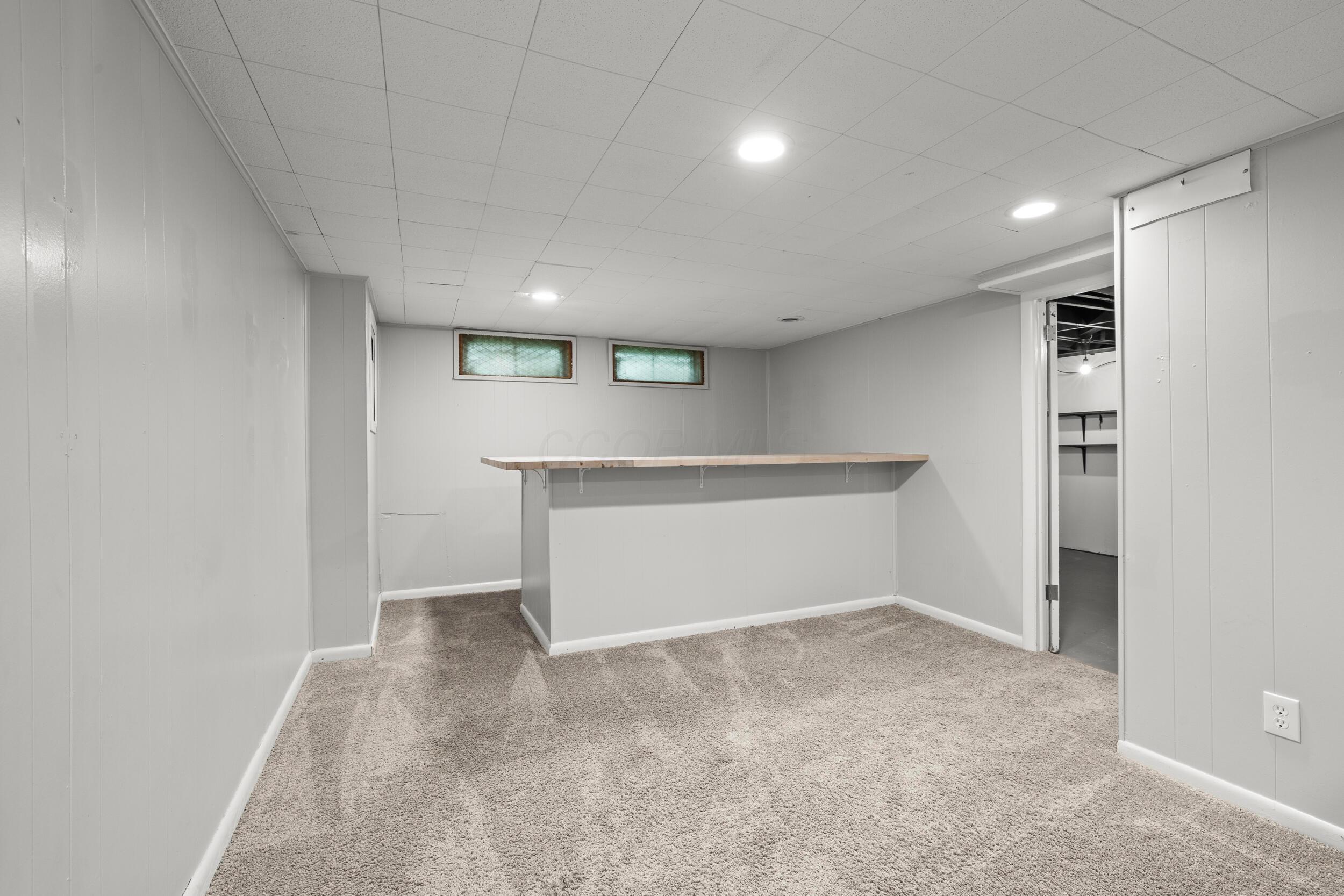 1296 Bryson Road Columbus, OH 43224 - Photo 27 of 30 Lower level rec room