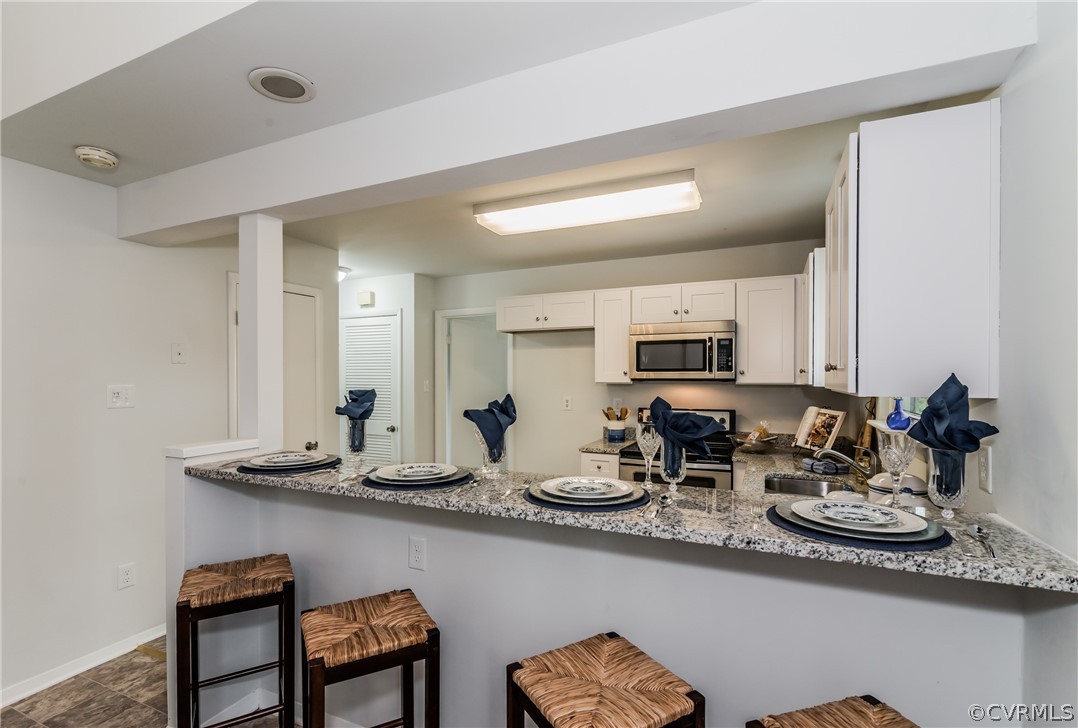 4403 Rabbit Foot Place North Chesterfield, VA 23236 - Photo 15 of 50 a kitchen with counter space cabinets and appliances