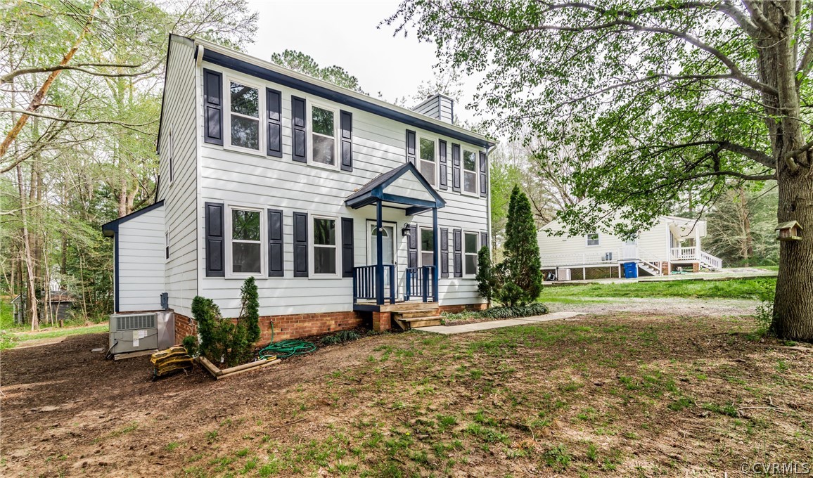 4403 Rabbit Foot Place North Chesterfield, VA 23236 - Photo 3 of 50 a front view of a house with a yard