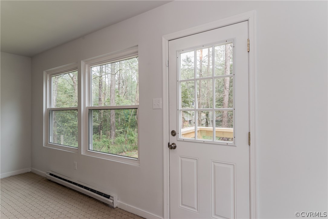 4403 Rabbit Foot Place North Chesterfield, VA 23236 - Photo 33 of 50 an empty room with wooden floor and windows