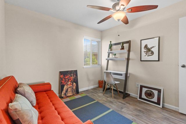 a room with furniture and a window