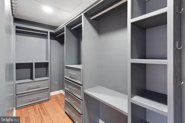 a kitchen with a refrigerator and an oven