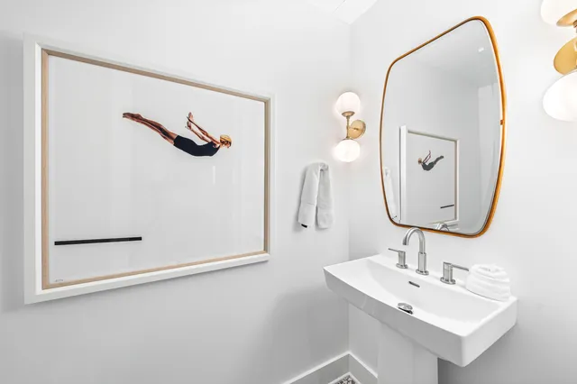 a bedroom with a bed and a cabinets