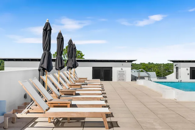 a view of a swimming pool with a terrace