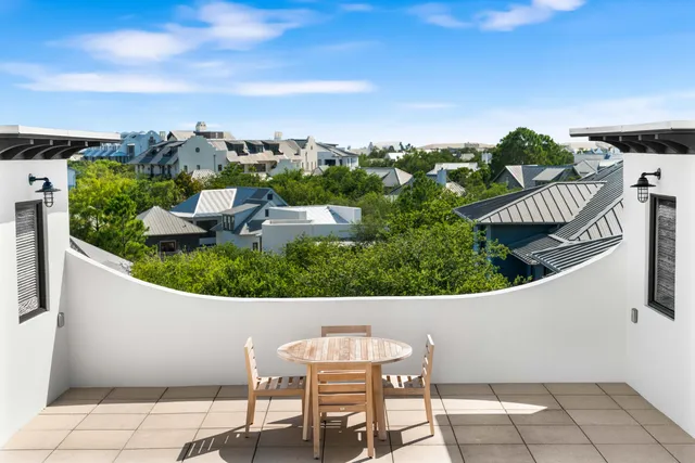 a view of swimming pool with outdoor seating