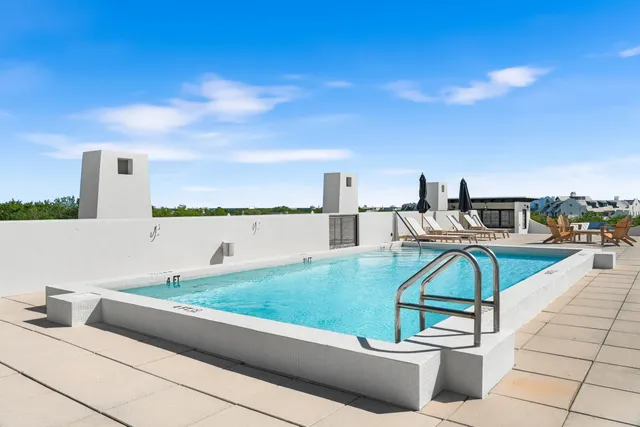 a view of a house with a roof deck