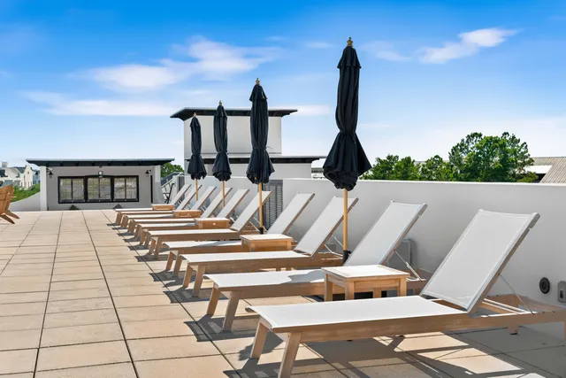 a view of a house with a roof deck