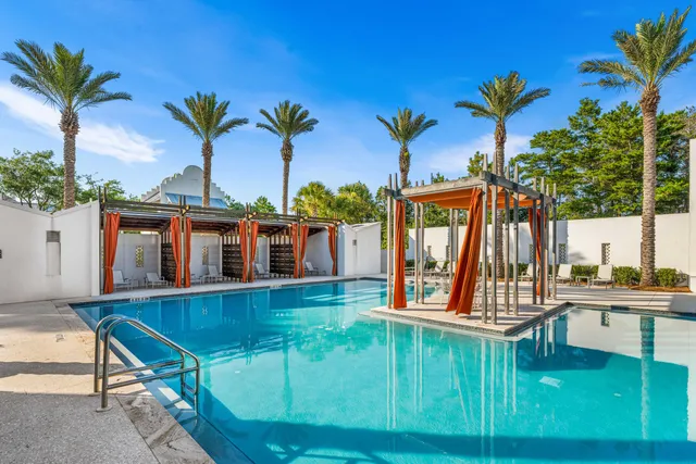 an aerial view of residential building and ocean