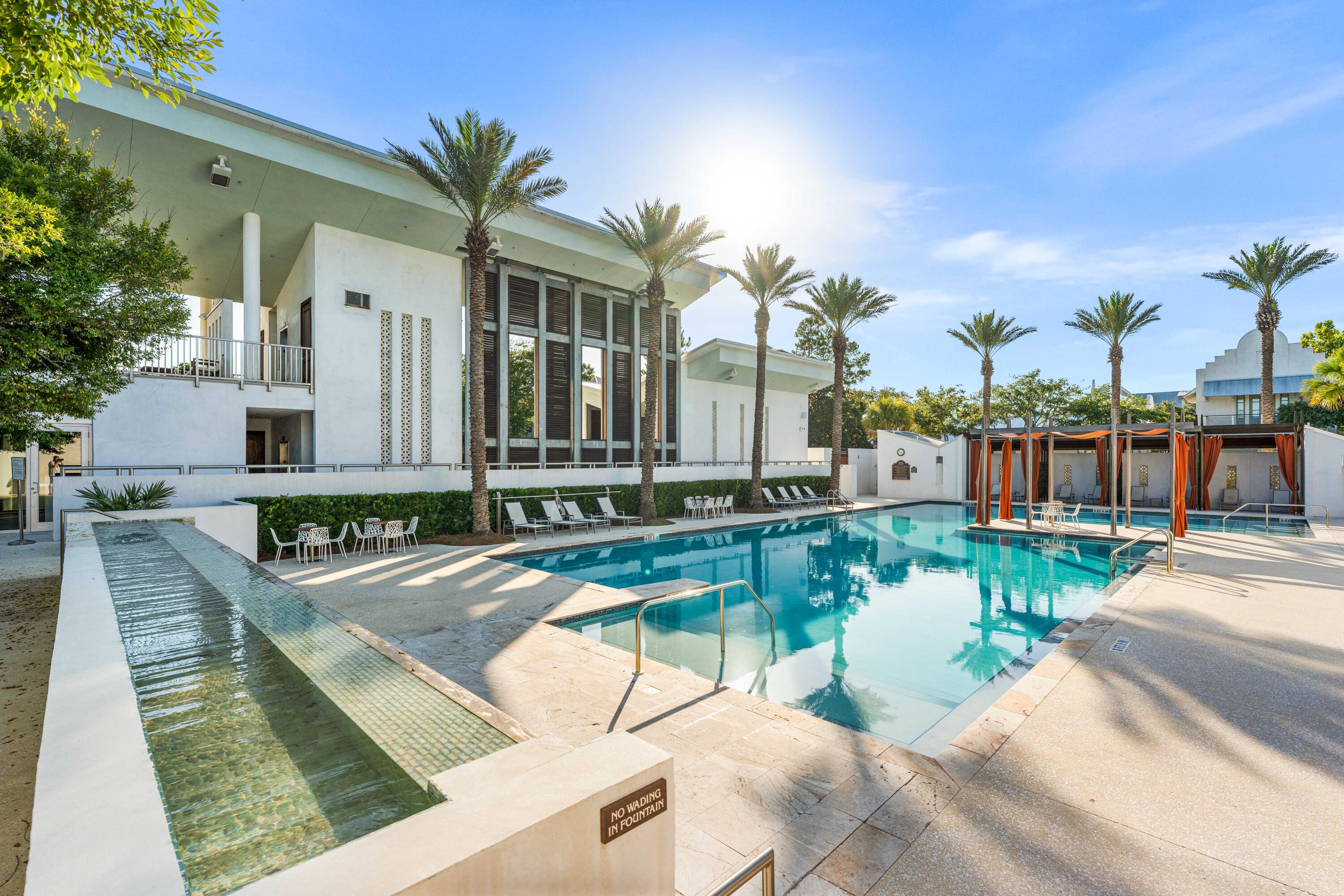 136 Georgetown Avenue, Unit 3B3 Inlet Beach, FL 32461 - Photo 53 of 68 a view of a house with swimming pool and sitting area