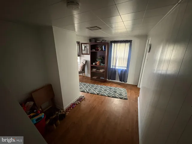 a view of a hallway with workspace