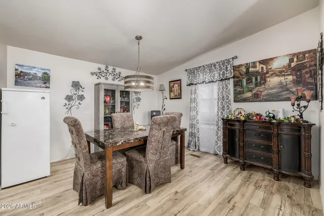 a view of a dining room with furniture