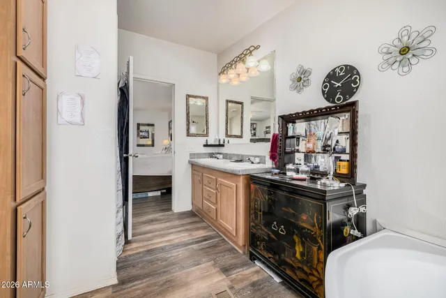 a kitchen with stainless steel appliances granite countertop a stove and cabinets