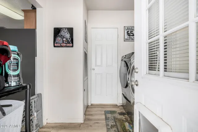 a utility room with dryer and washer