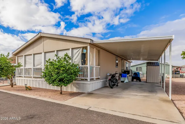 a view of a car park in front of a building