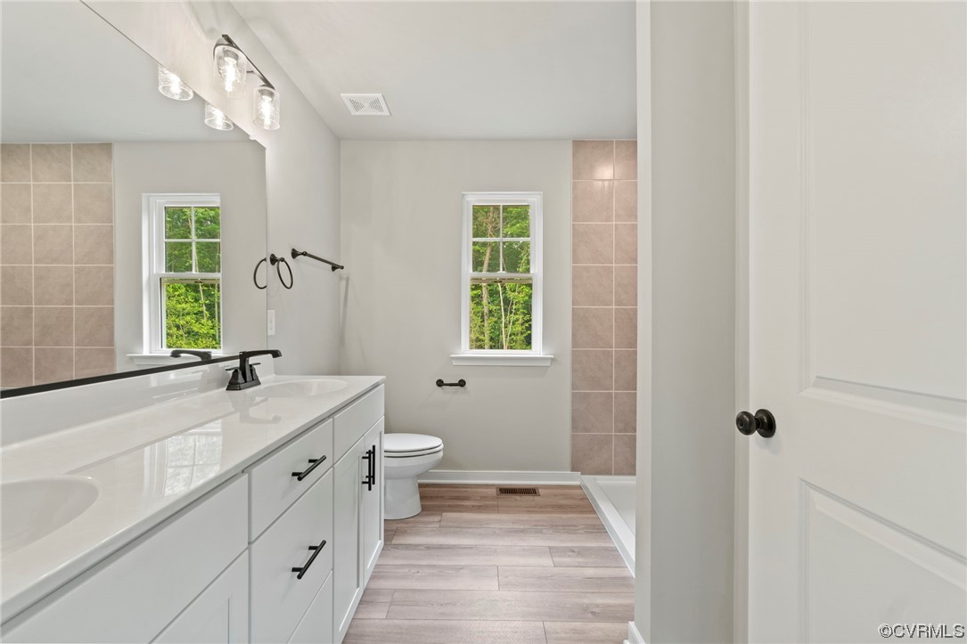 Tbd Centerville Road Mineral, VA 23117 - Photo 21 of 27 a bathroom with a granite countertop sink toilet and shower
