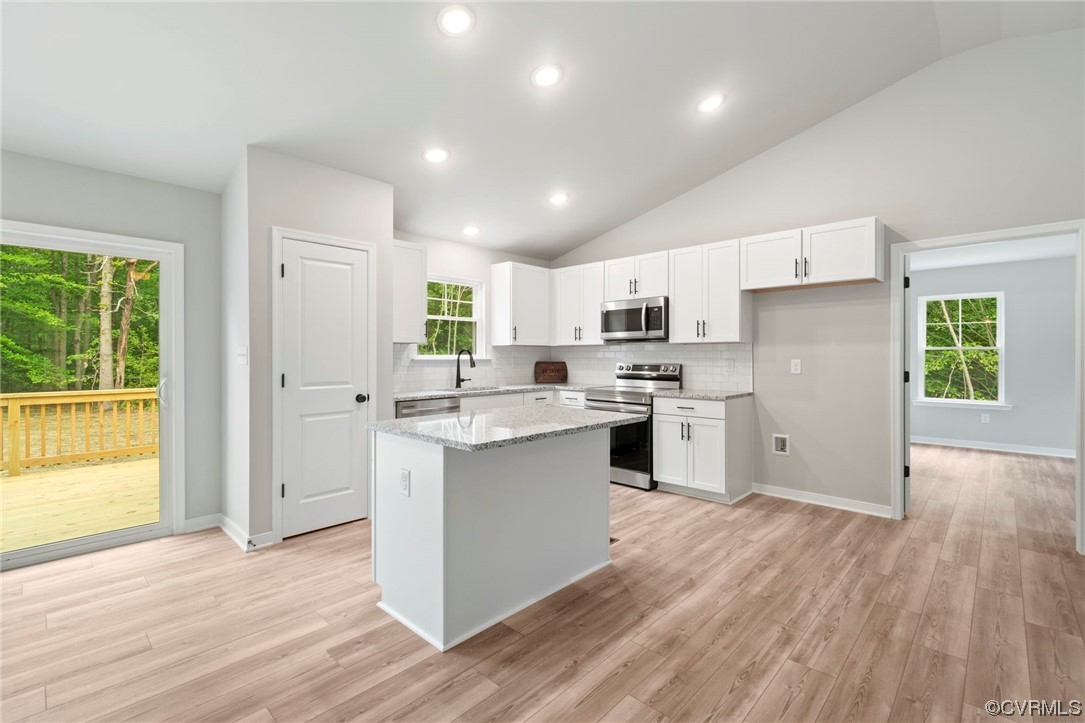 Tbd Centerville Road Mineral, VA 23117 - Photo 3 of 27 a kitchen with white cabinets and wooden floor