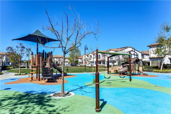 a view of a park with swings