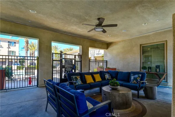 a living room with furniture and a window