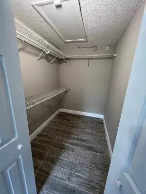 a view of an empty walk in closet