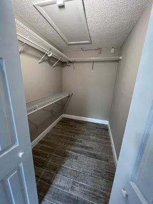 545 Trace Circle, Unit 204 Deerfield Beach, FL 33441 - Photo 9 of 10 a view of an empty walk in closet